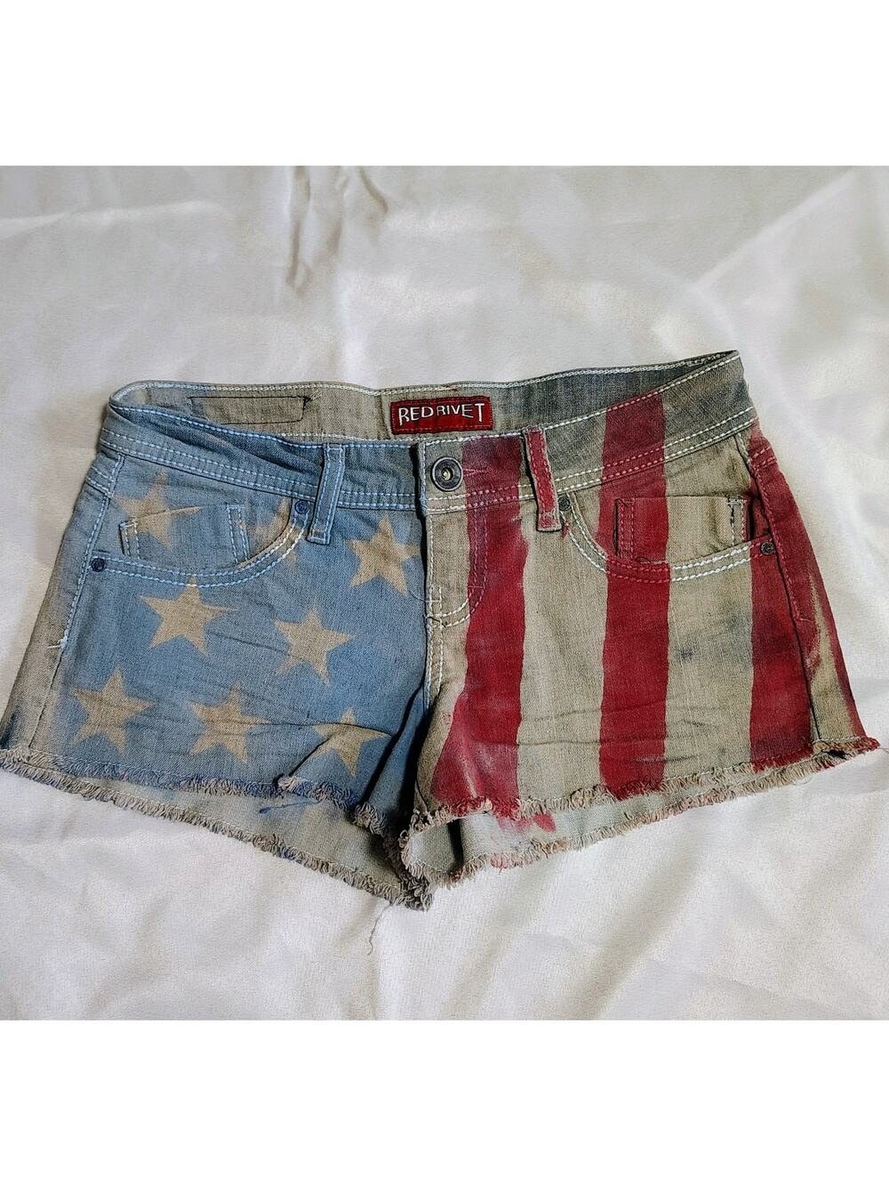 Denim Shorts featuring distressed American Flag with frayed hems Size 3